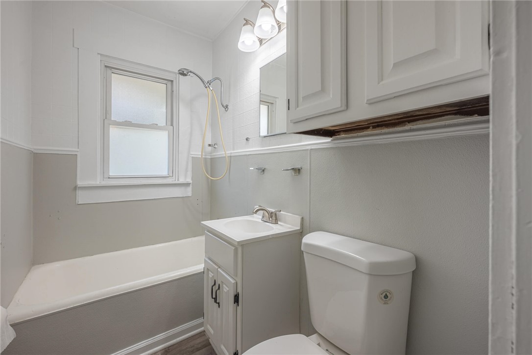 2118 Hillside Avenue Springfield, OH 45503 - Photo 13 of 28 This clean bathroom features practical design, a comfortable soaking tub, and functional fixtures for daily routines.
