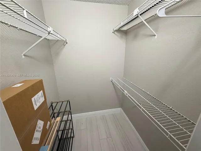 a view of a room with racks on the wall