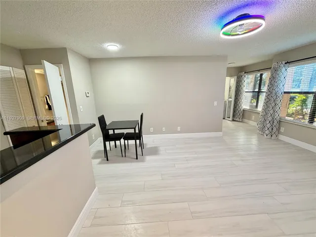 a view of a livingroom with furniture