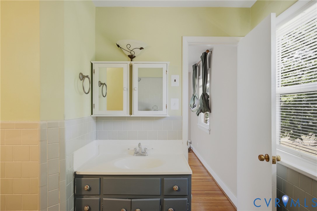 8210 Ireton Road Henrico, VA 23228 - Photo 18 of 36 a bathroom with a sink and a mirror