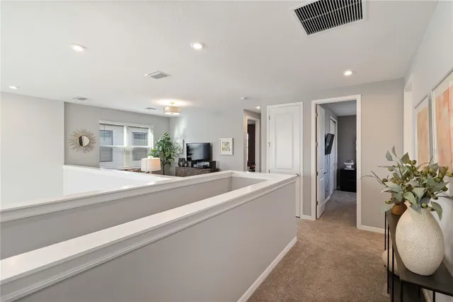 a bathroom with a granite countertop sink a mirror and a shower