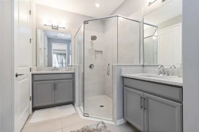 a bedroom with a bed and a table in it