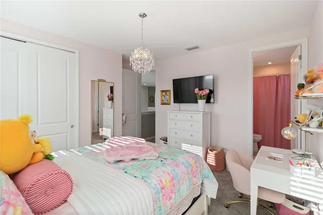 a view of a backyard with sitting area