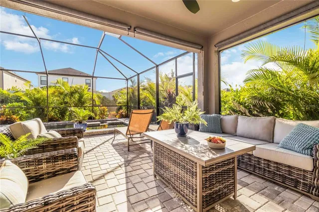 an aerial view of a house with a garden