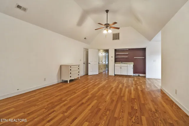 a view of a livingroom with wooden floor