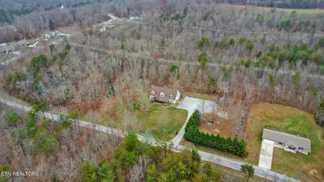 a view of a houses with a yard