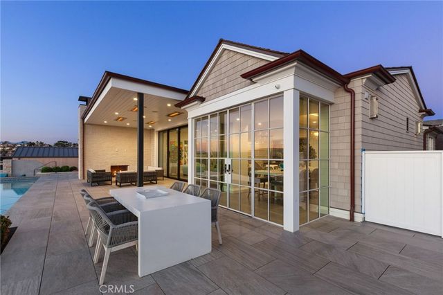 a view of living room and porch with furniture