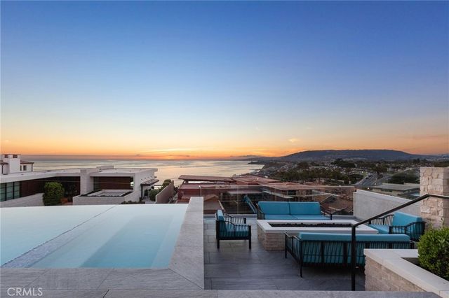 a view of a terrace with sitting area