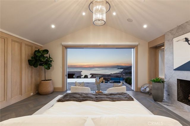 a lobby with furniture and floor to ceiling window