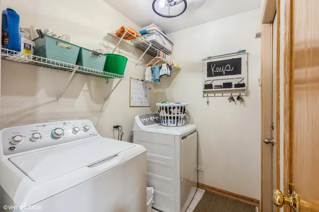 a utility room with dryer and washer