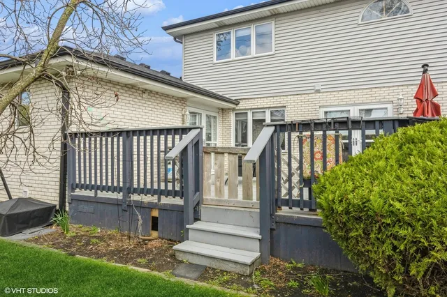 a view of outdoor space with deck and garden
