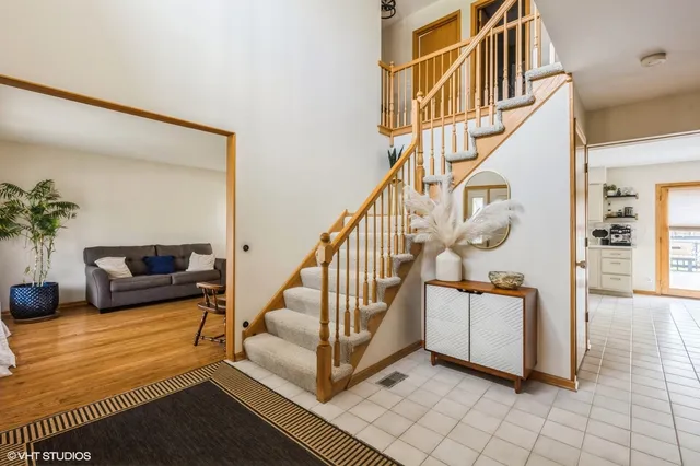 a view of entryway livingroom and hall