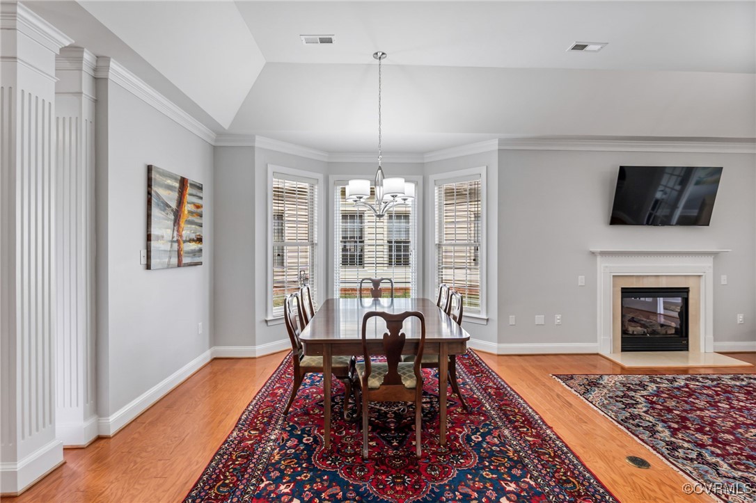 5060 Park Commons Loop Glen Allen, VA 23059 - Photo 16 of 38 a view of a dining room with furniture window and wooden floor