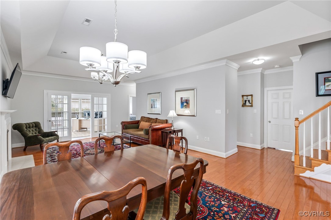 5060 Park Commons Loop Glen Allen, VA 23059 - Photo 17 of 38 a living room with furniture chandelier and a flat screen tv
