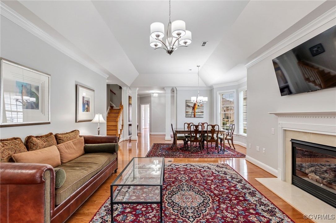 5060 Park Commons Loop Glen Allen, VA 23059 - Photo 19 of 38 a living room with furniture chandelier and a fireplace