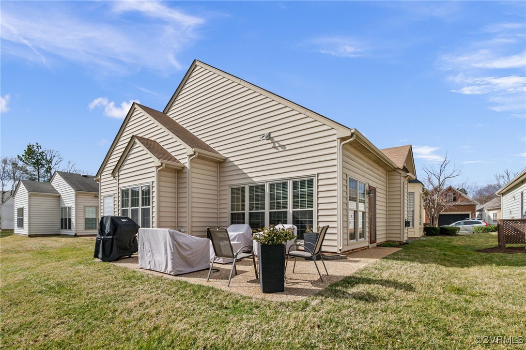 5060 Park Commons Loop Glen Allen, VA 23059 - Photo 34 of 38 a view of backyard of house with seating space
