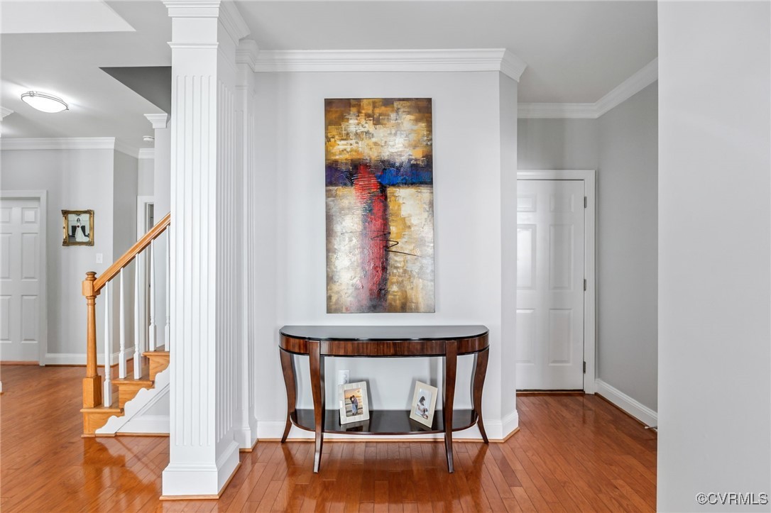 5060 Park Commons Loop Glen Allen, VA 23059 - Photo 7 of 38 a view of a hallway with furniture and wooden floor