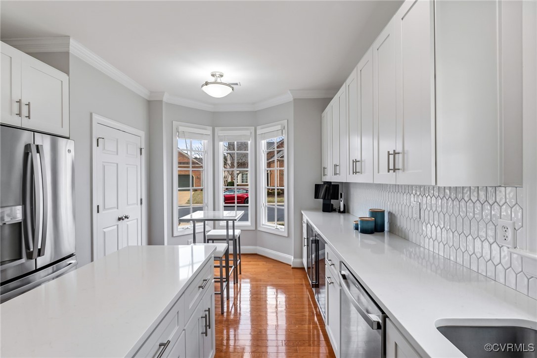 5060 Park Commons Loop Glen Allen, VA 23059 - Photo 10 of 38 a kitchen with granite countertop a sink stove and refrigerator