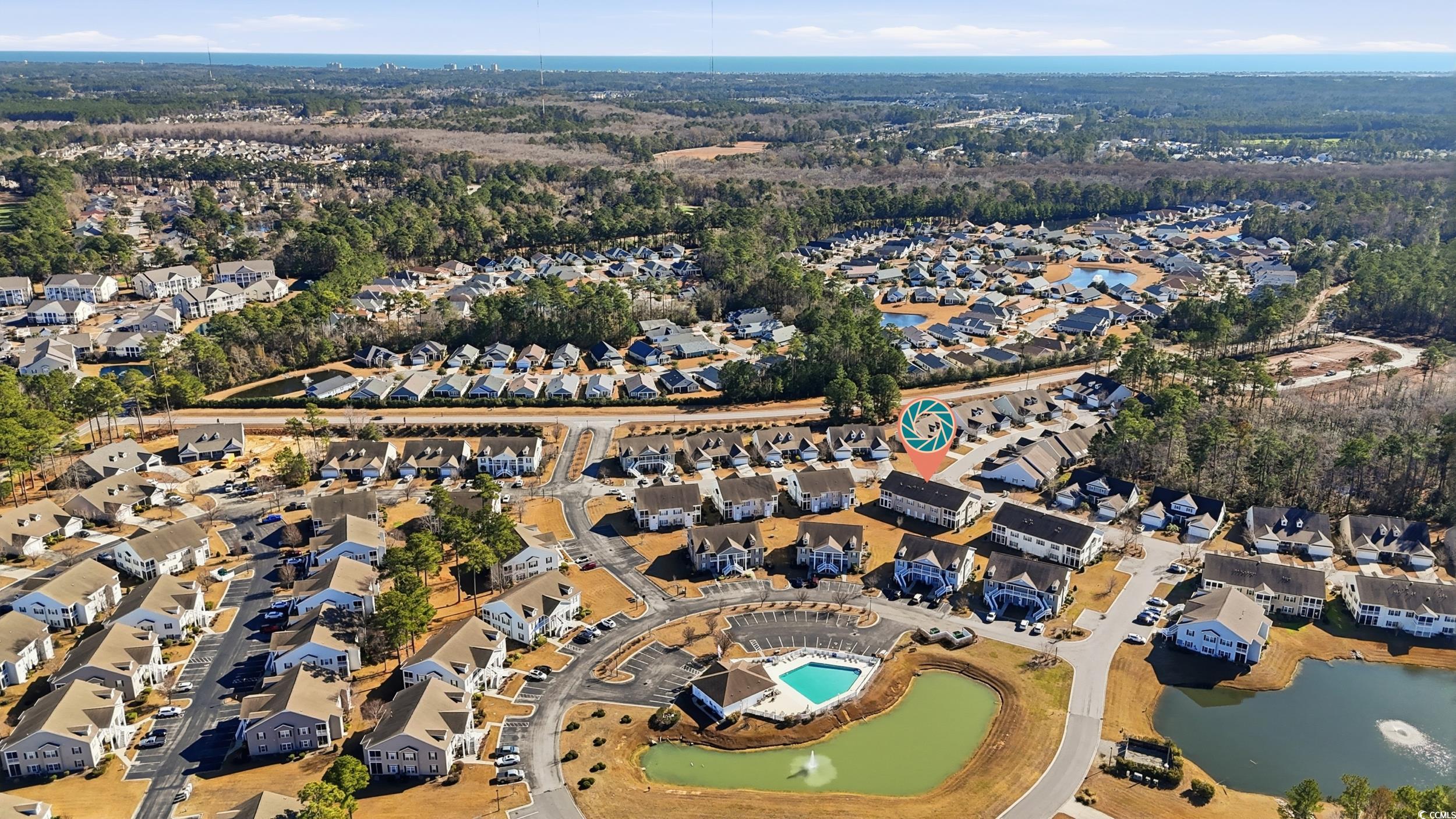 822 Sail Lane, Unit 103 Murrells Inlet, SC 29576 - Photo 33 of 37 Aerial overview of property's location featuring nearby suburban area