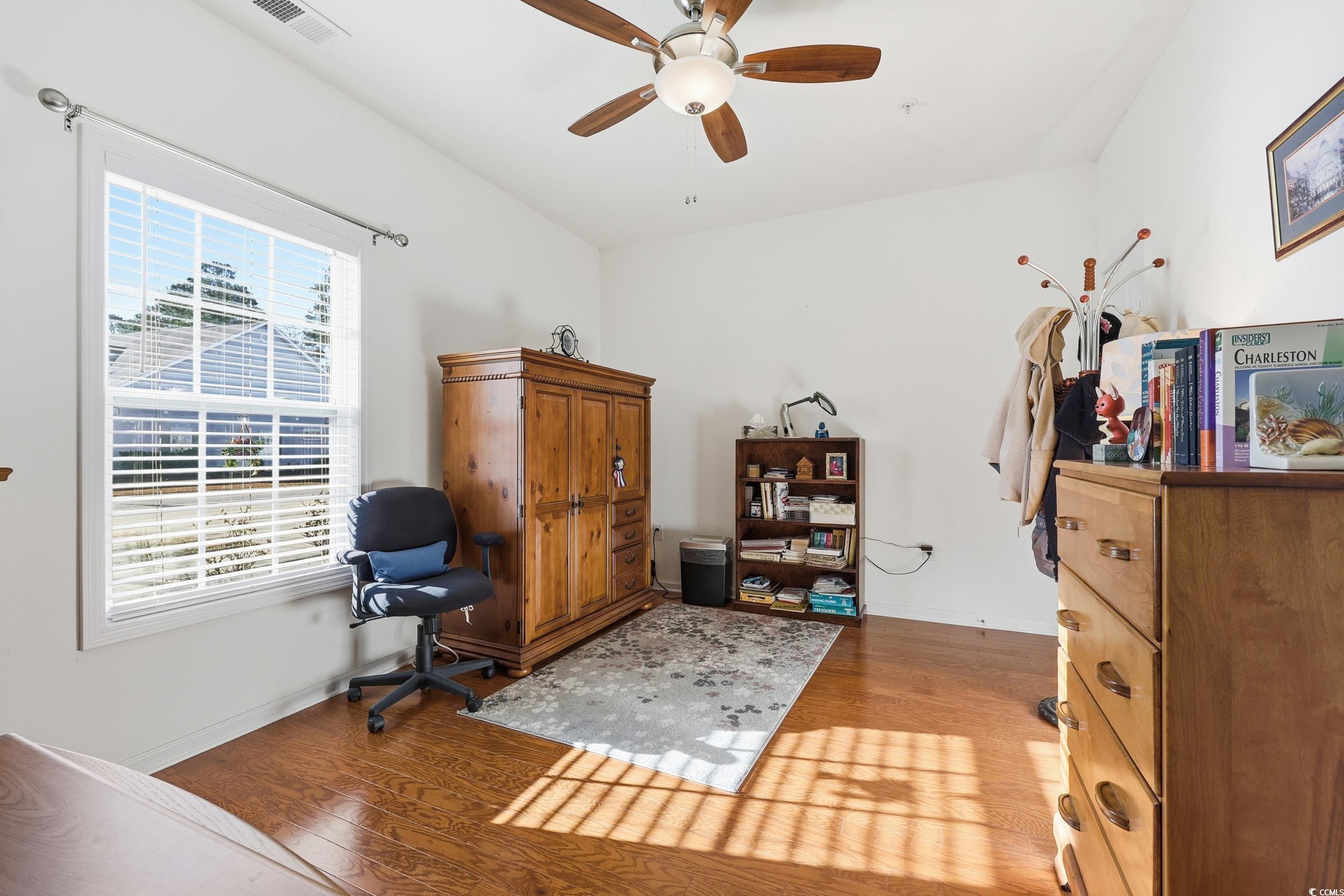 822 Sail Lane, Unit 103 Murrells Inlet, SC 29576 - Photo 6 of 37 Front office featuring wood finished floors and ceiling fan