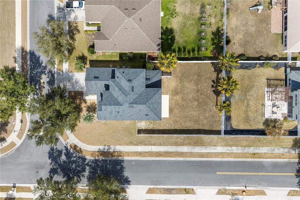 4199 Southwest 46th Court Ocala, FL 34474 - Photo 47 of 50 an aerial view of a house with a swimming pool
