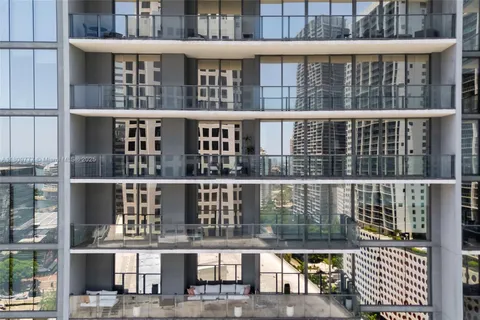 a view of a large building from a balcony