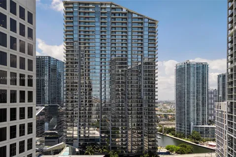 a view of a city with tall buildings