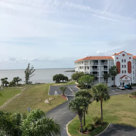 a view of a house with a ocean view