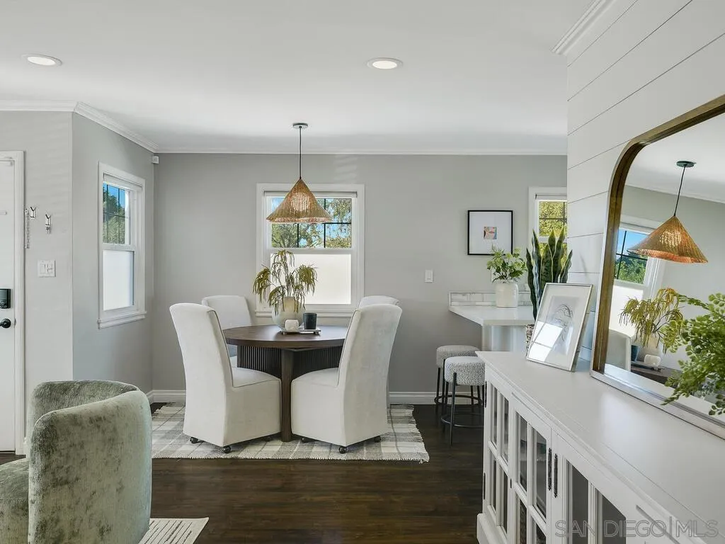 4751 Altadena Avenue San Diego, CA 92115 - Photo 18 of 47 a view of a dining room with furniture window and wooden floor