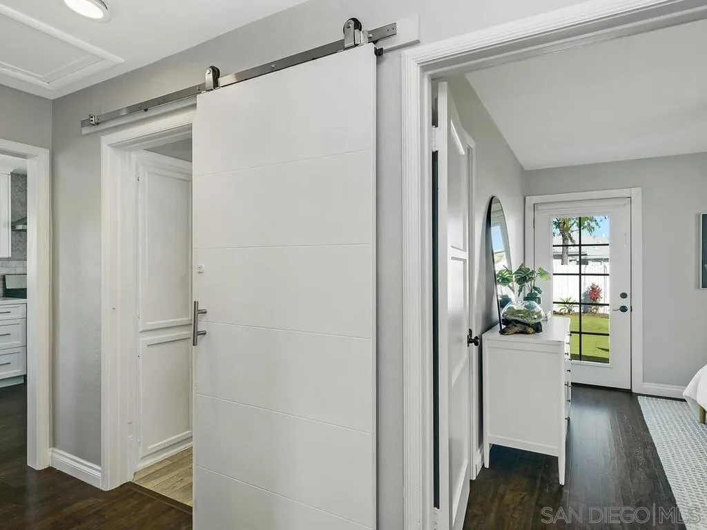 4751 Altadena Avenue San Diego, CA 92115 - Photo 23 of 47 a view of a walk in closet and bedroom
