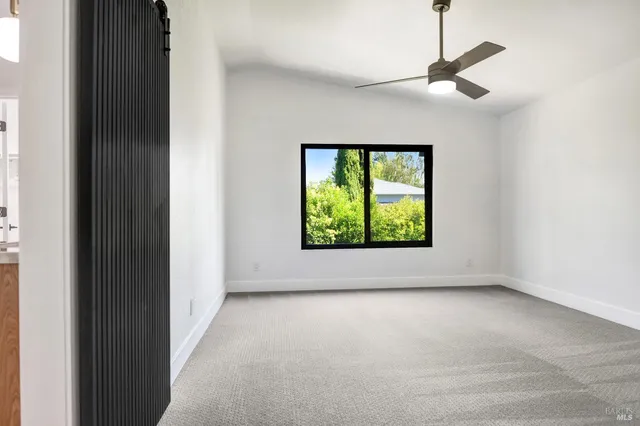 a bathroom with a toilet a sink and shower