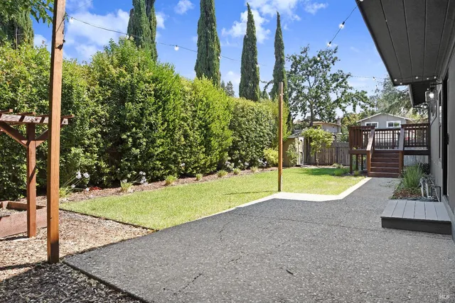 a view of a dining room that has a table and chairs
