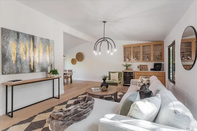 a bathroom with a shower a mirror and a shower