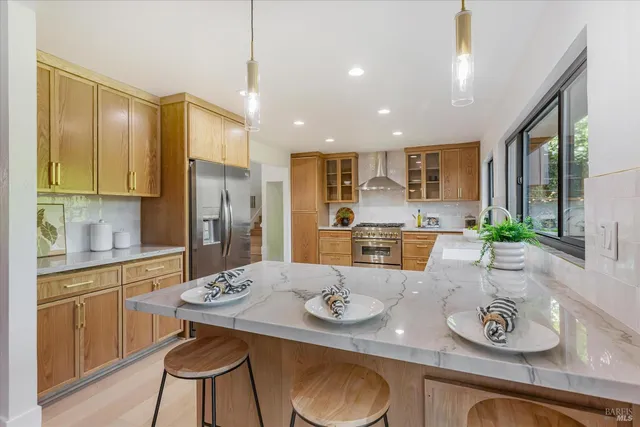 a view of entryway with wooden floor and fence