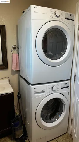 a utility room with dryer and washer