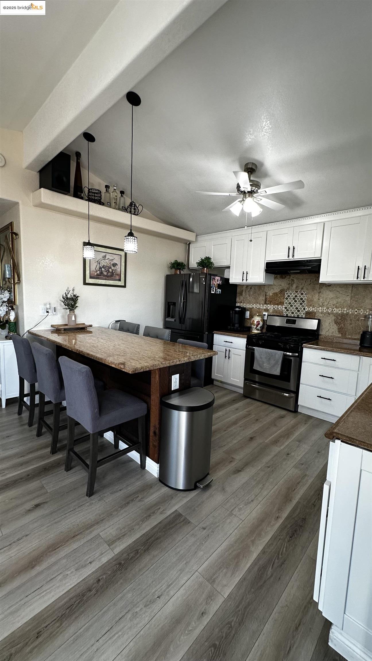 3301 Buchanan Road, Unit 89 Antioch, CA 94509 - Photo 19 of 22 a kitchen with a stove a refrigerator and chairs