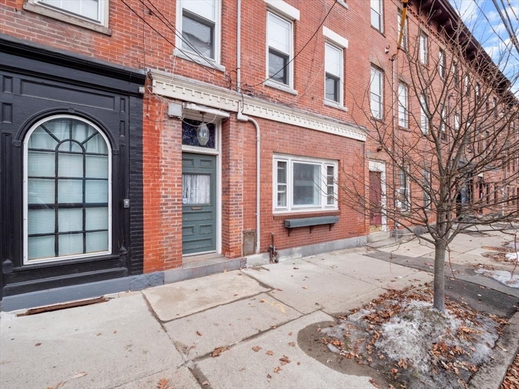 67 Broadway, Unit 1 Chelsea, MA 02150 - Photo 1 of 17 a front view of a house