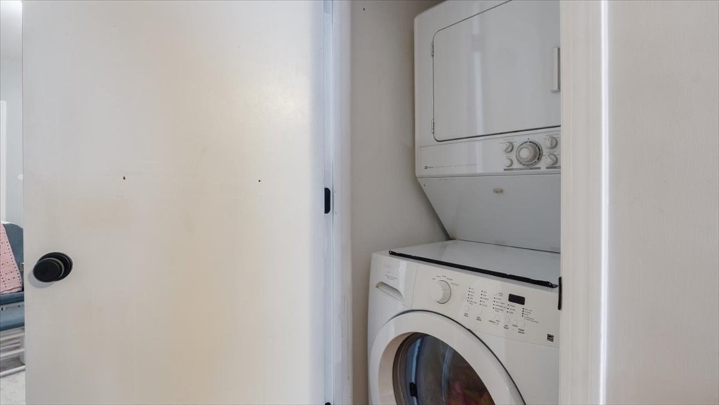 67 Broadway, Unit 1 Chelsea, MA 02150 - Photo 9 of 17 a utility room with dryer and washer