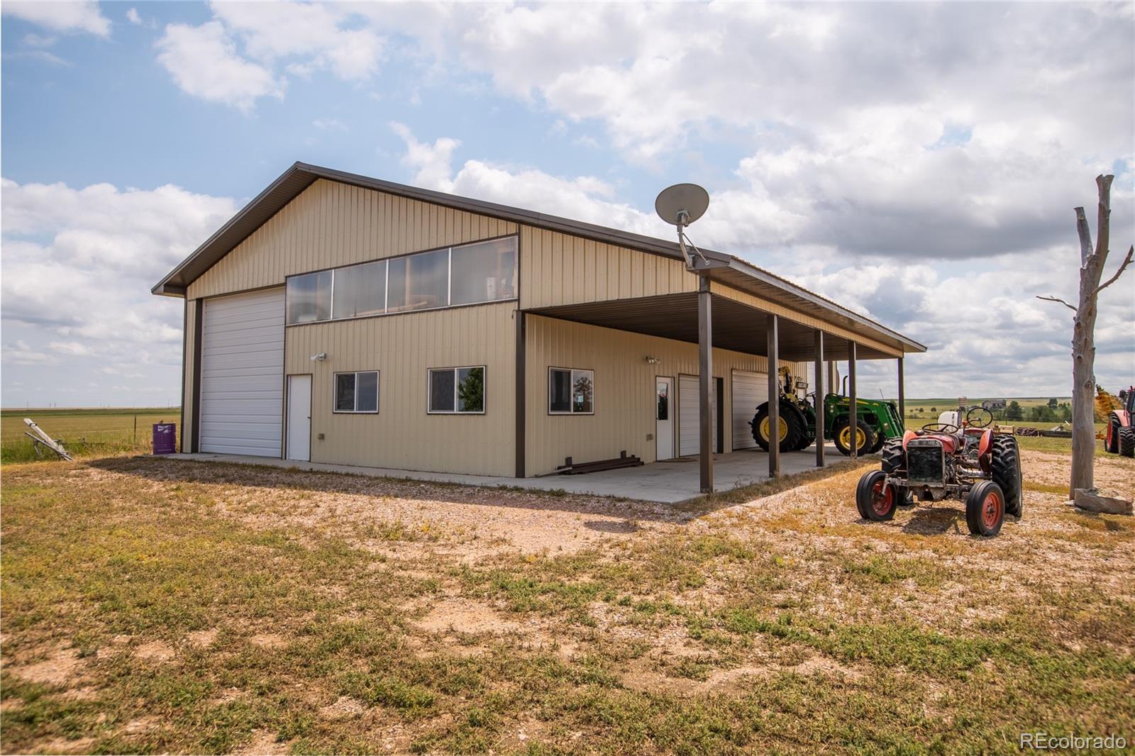 11503 East Smith Road Elbert, CO 80106 - Photo 36 of 44 a view of a house with backyard
