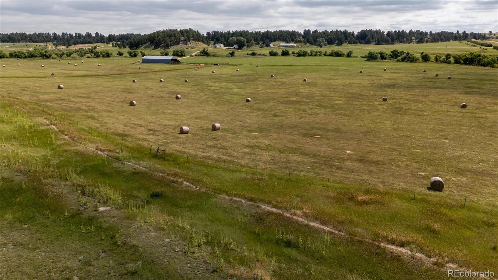 11503 East Smith Road Elbert, CO 80106 - Photo 6 of 44 a view of a lake view