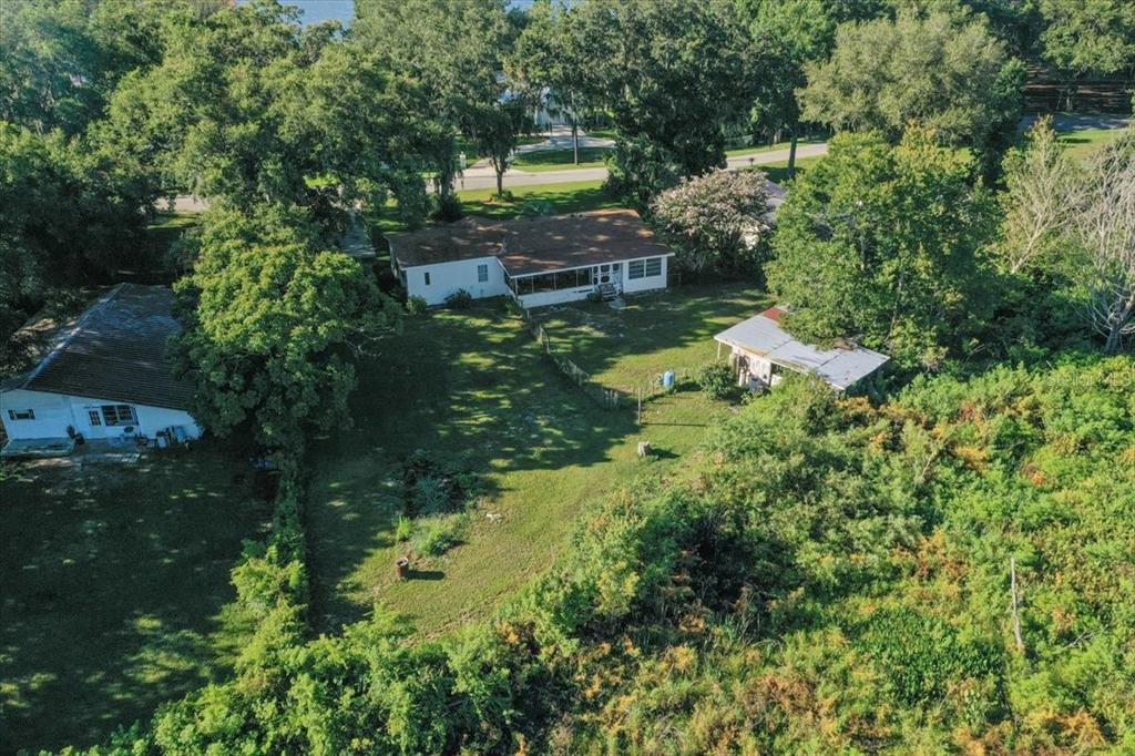 10865 Southeast Timucuan Road Summerfield, FL 34491 - Photo 6 of 35 a aerial view of a house with a yard