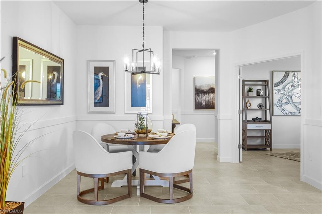 14656 Ballast Way Alva, FL 33920 - Photo 14 of 30 a dining room with furniture and window
