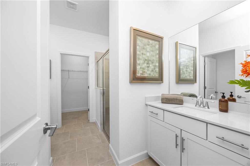 14656 Ballast Way Alva, FL 33920 - Photo 21 of 30 a bathroom with a sink and a mirror