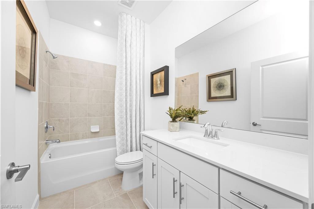 14656 Ballast Way Alva, FL 33920 - Photo 28 of 30 a bathroom with a sink a toilet and shower