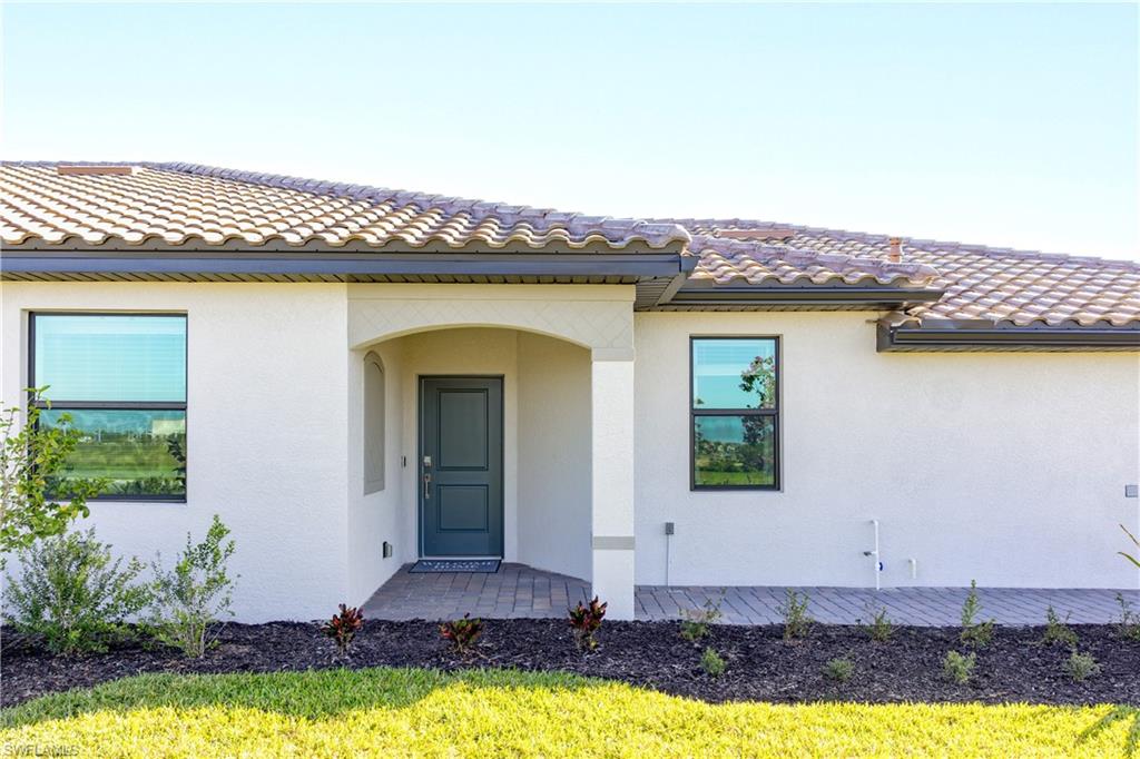 14656 Ballast Way Alva, FL 33920 - Photo 4 of 30 a view of a house with a swimming pool