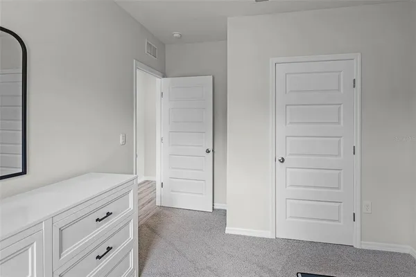 a view of an empty walk in closet