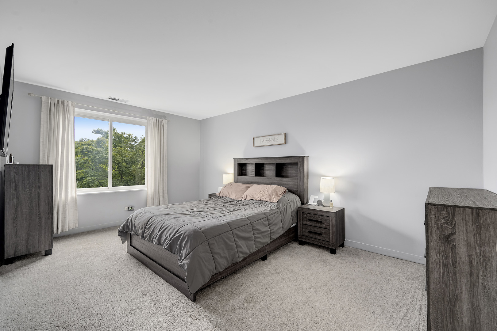 420 Walnut Creek Road, Unit 3406 Lisle, IL 60532 - Photo 12 of 21 a bedroom with a bed and a window
