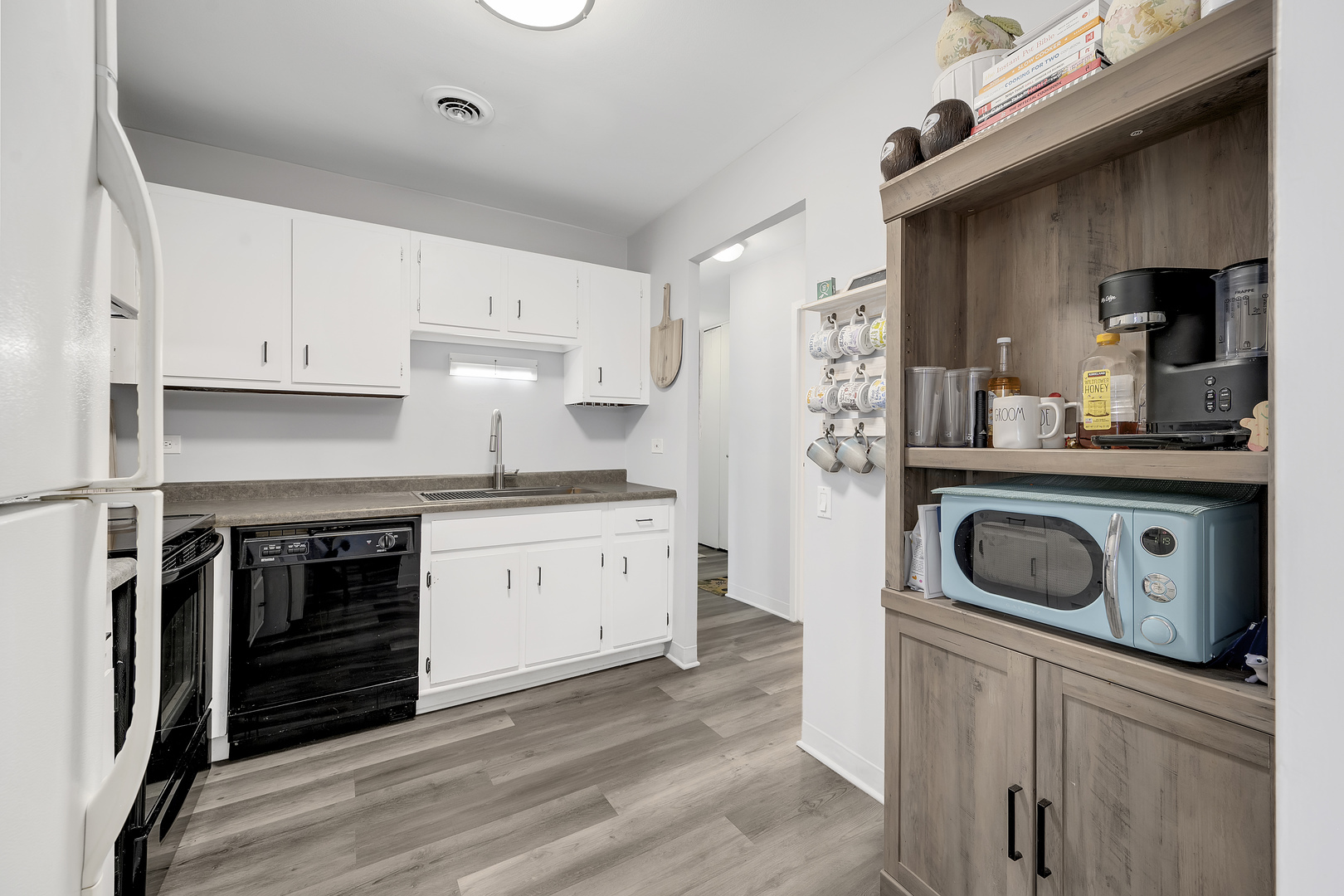 420 Walnut Creek Road, Unit 3406 Lisle, IL 60532 - Photo 6 of 21 a kitchen with stainless steel appliances granite countertop a stove and a refrigerator