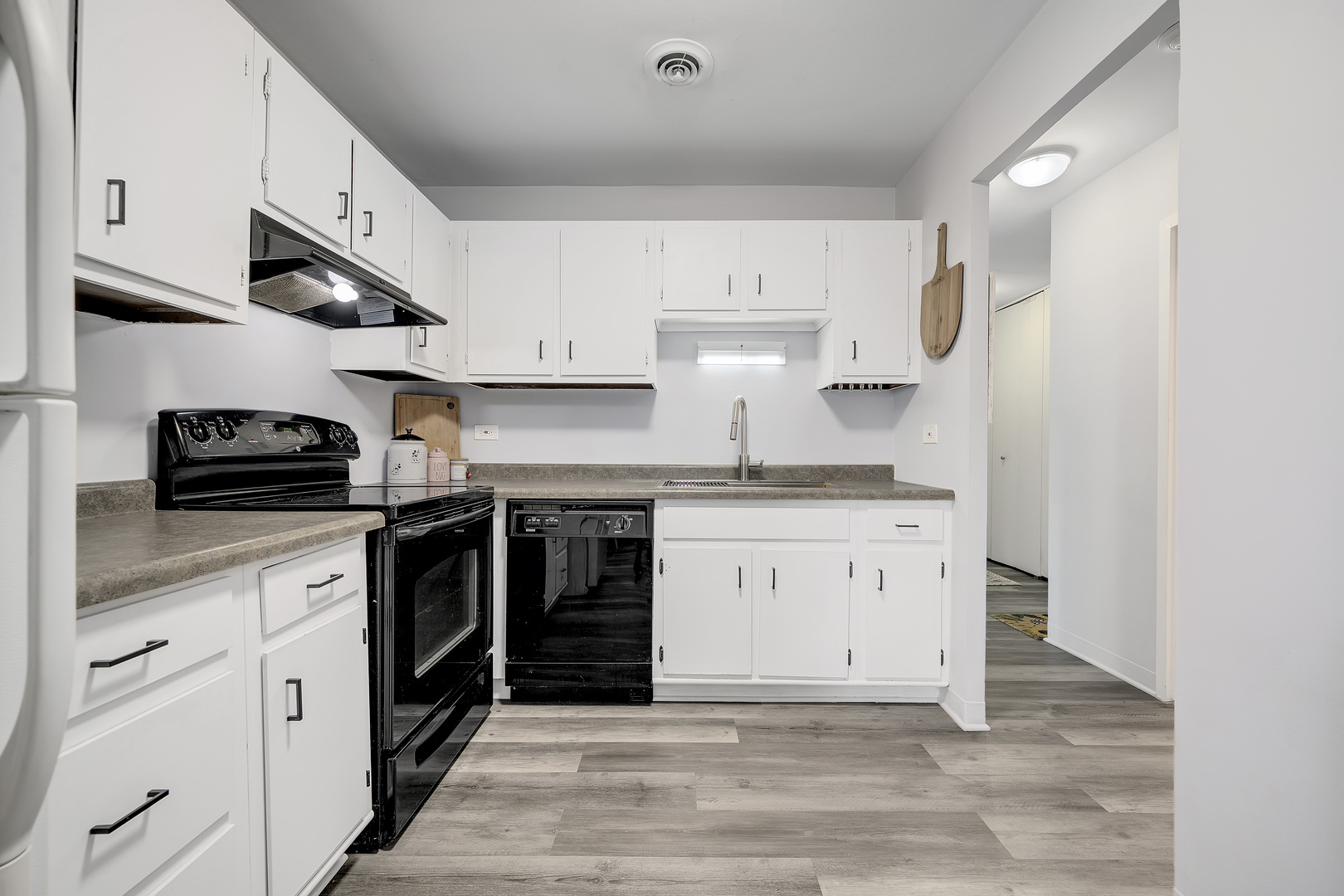 420 Walnut Creek Road, Unit 3406 Lisle, IL 60532 - Photo 7 of 21 a kitchen with stainless steel appliances granite countertop a stove a sink and a refrigerator