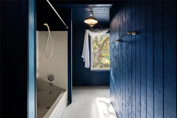 a view of house with backyard